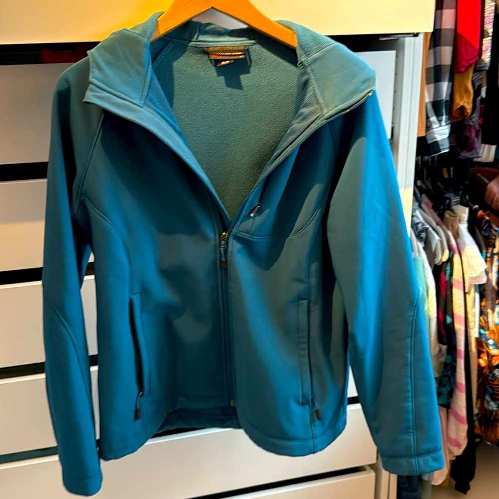 Light jackets in teal
